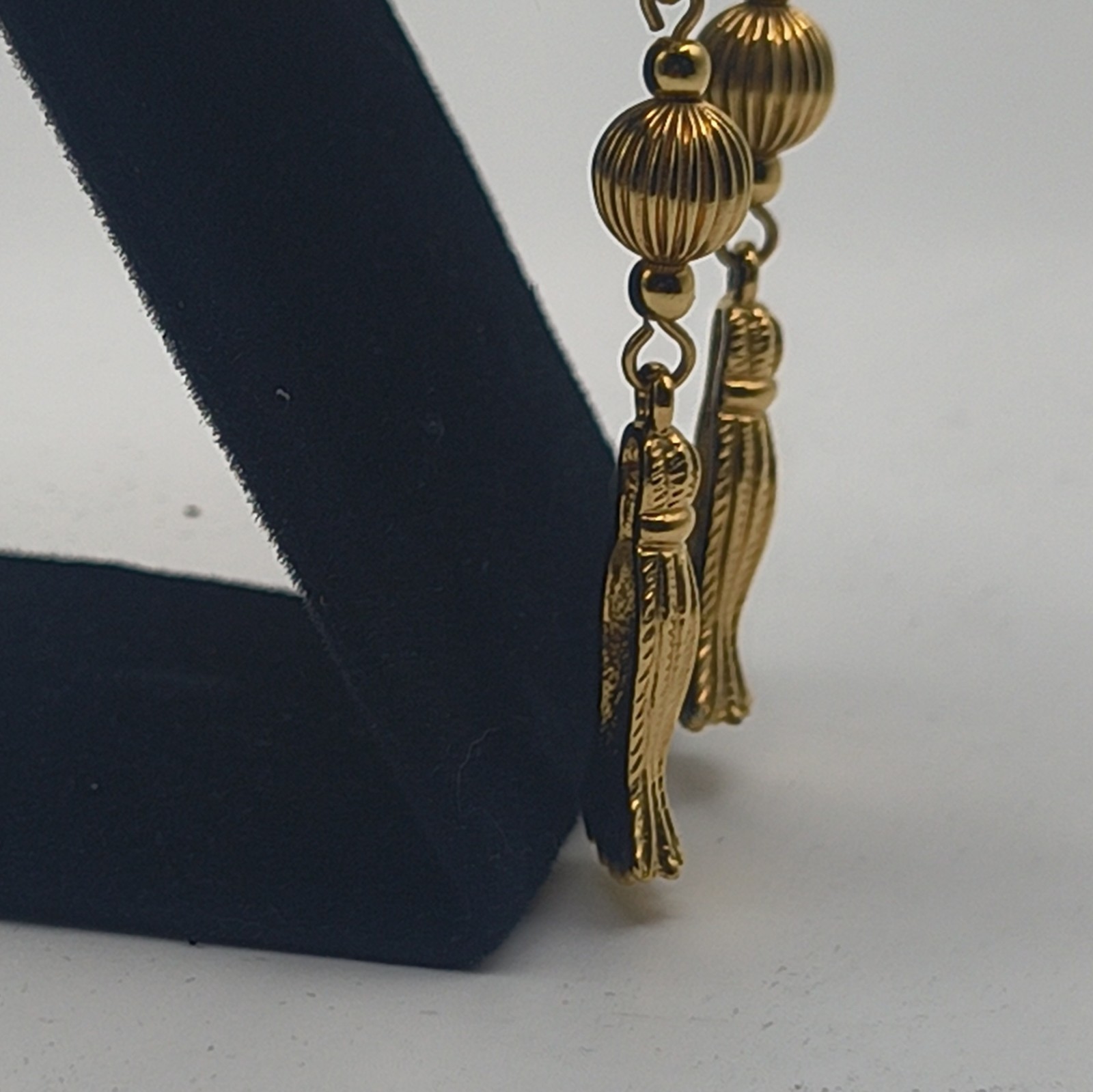 AVON Signed Gold Tone Dangle Drop Post Earrings Ribbed Bead Tassel Charm