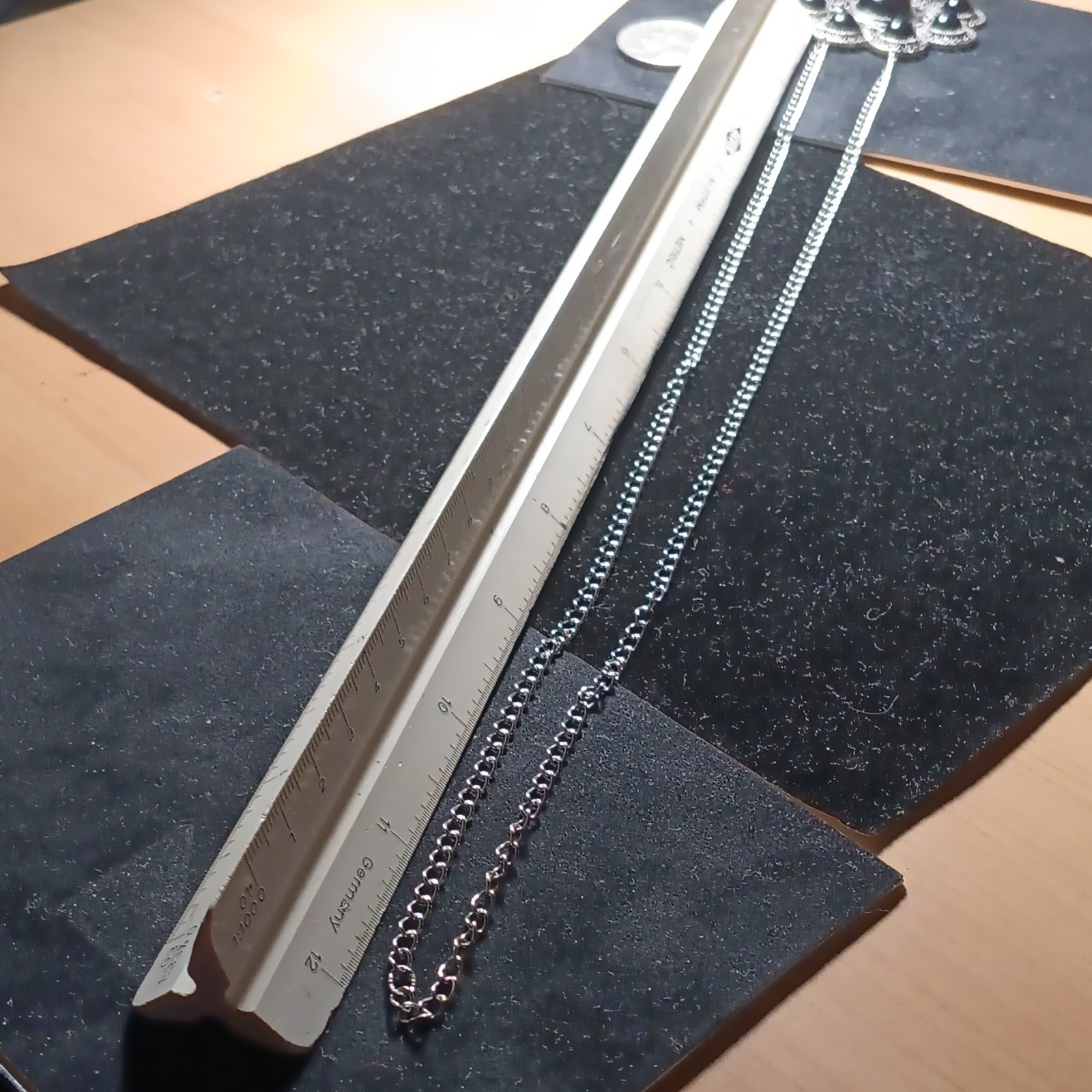 Black & Silver-Tone Pendant On A 24″ Stainless Steel Chain With No Clasp