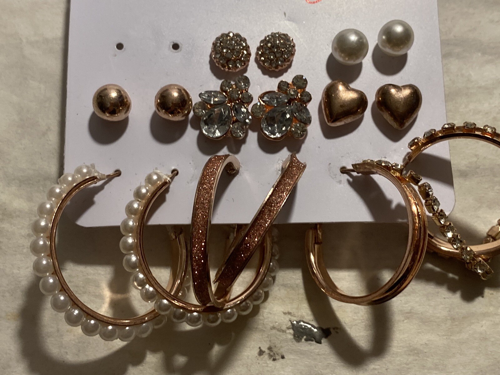 8 Pair Of Pierced Earrings On A Card