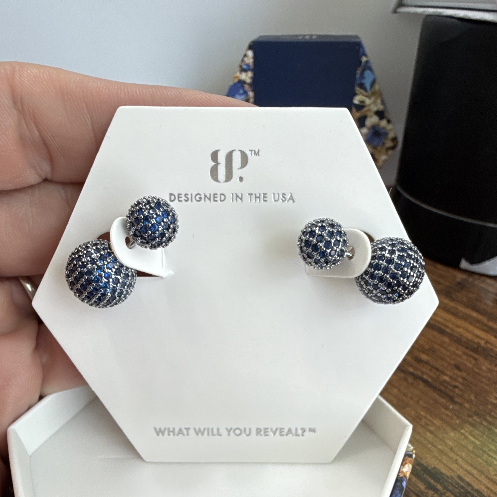 BP always in longing earrings Lab created Sapphire, gold and hematite plating