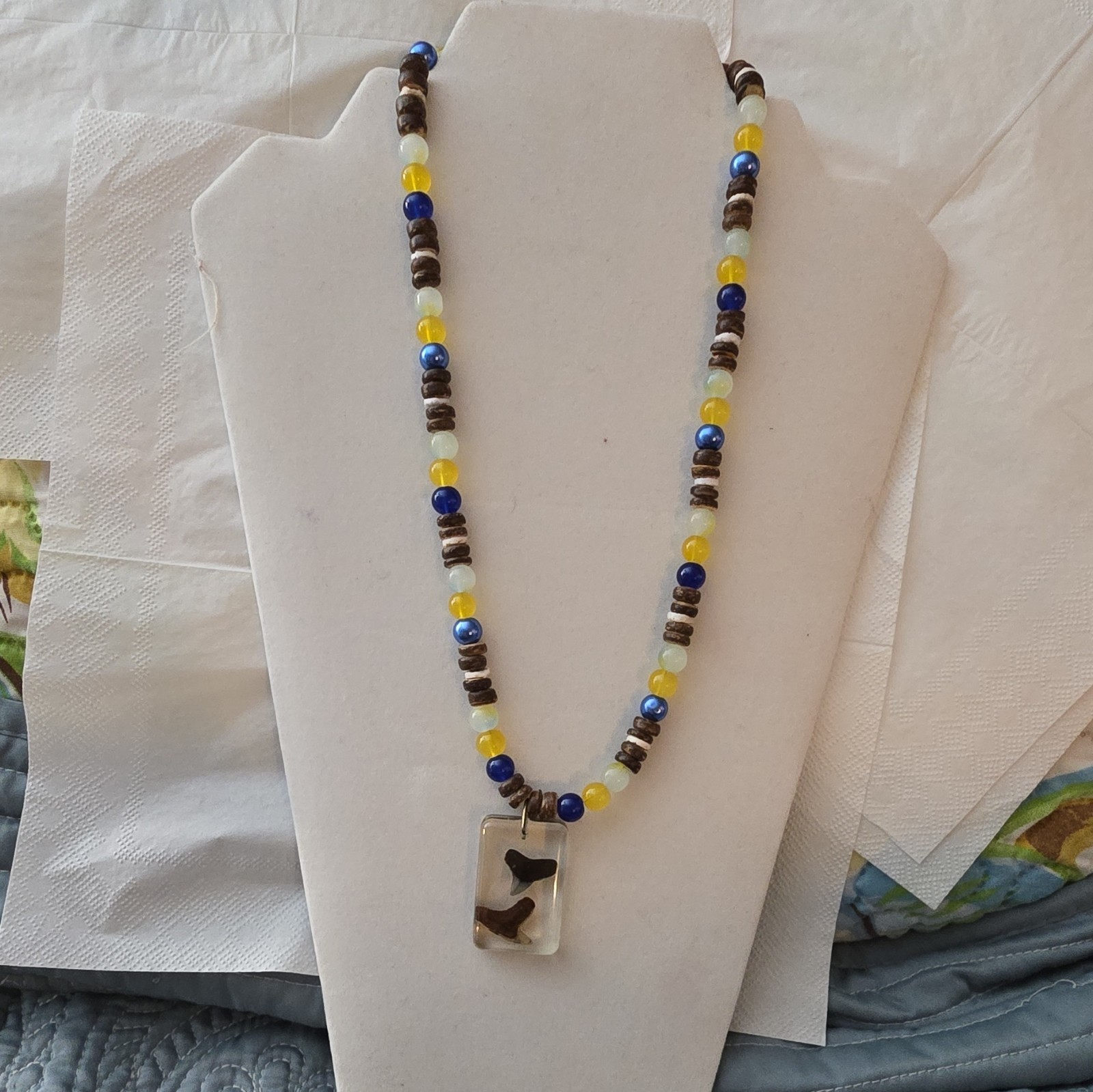 Beaded Necklace with Resin Shark Tooth Pendant, Glass And Coconut Shell Beads