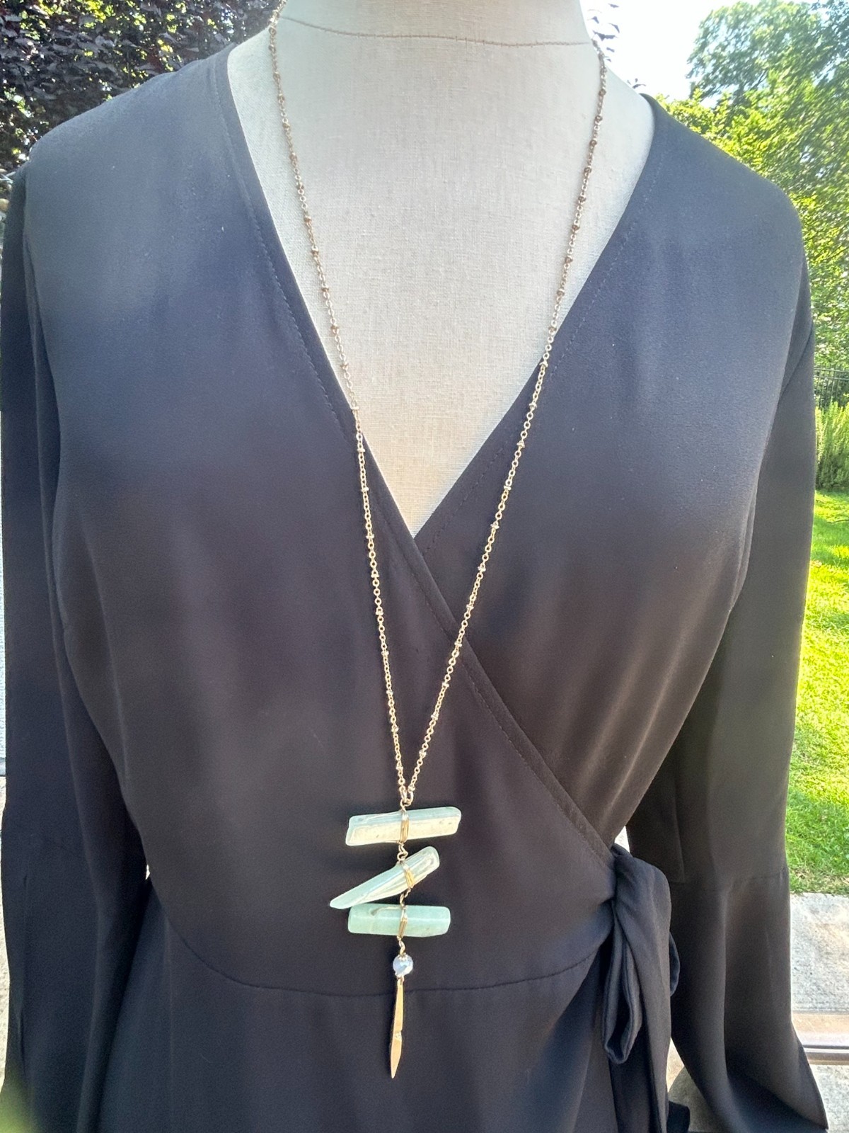 LOTE OF 2 LONG GOLD TONE NECKLACES ANN TAYLOR STAR BURS UMBRANDED STONE BAR PEND