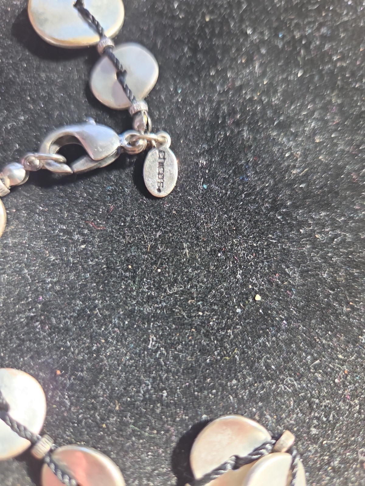Chico silver dist and string necklace Lobster claw clasp