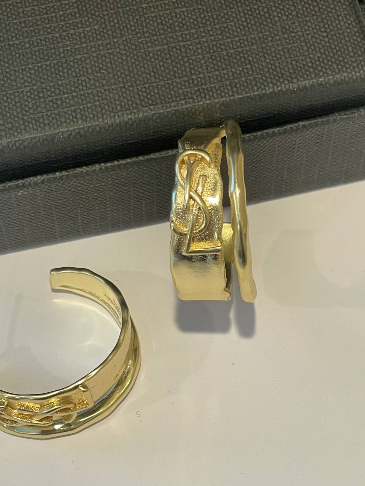 SAINT LAURENT Gold earrings with butterfly brooch