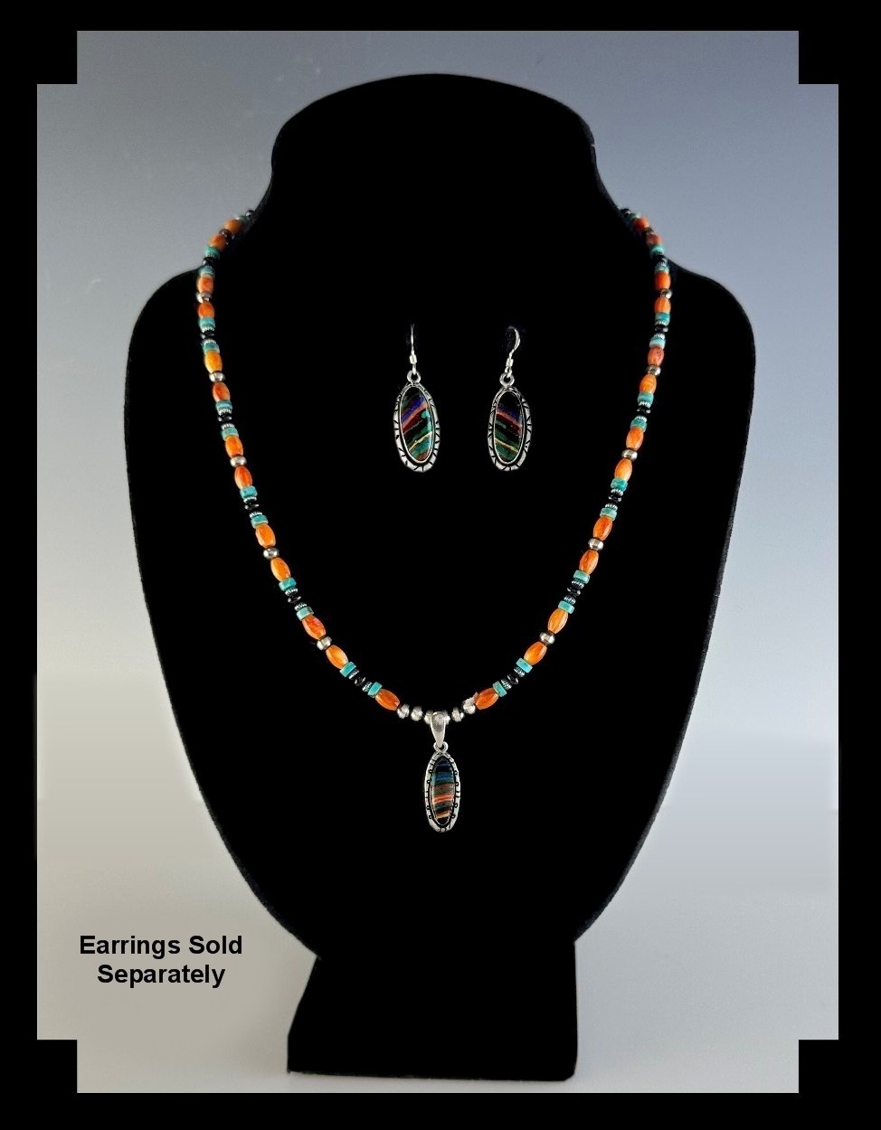 White Fox Multi Gemstone Necklace with Rainbow Calsilica Pendant