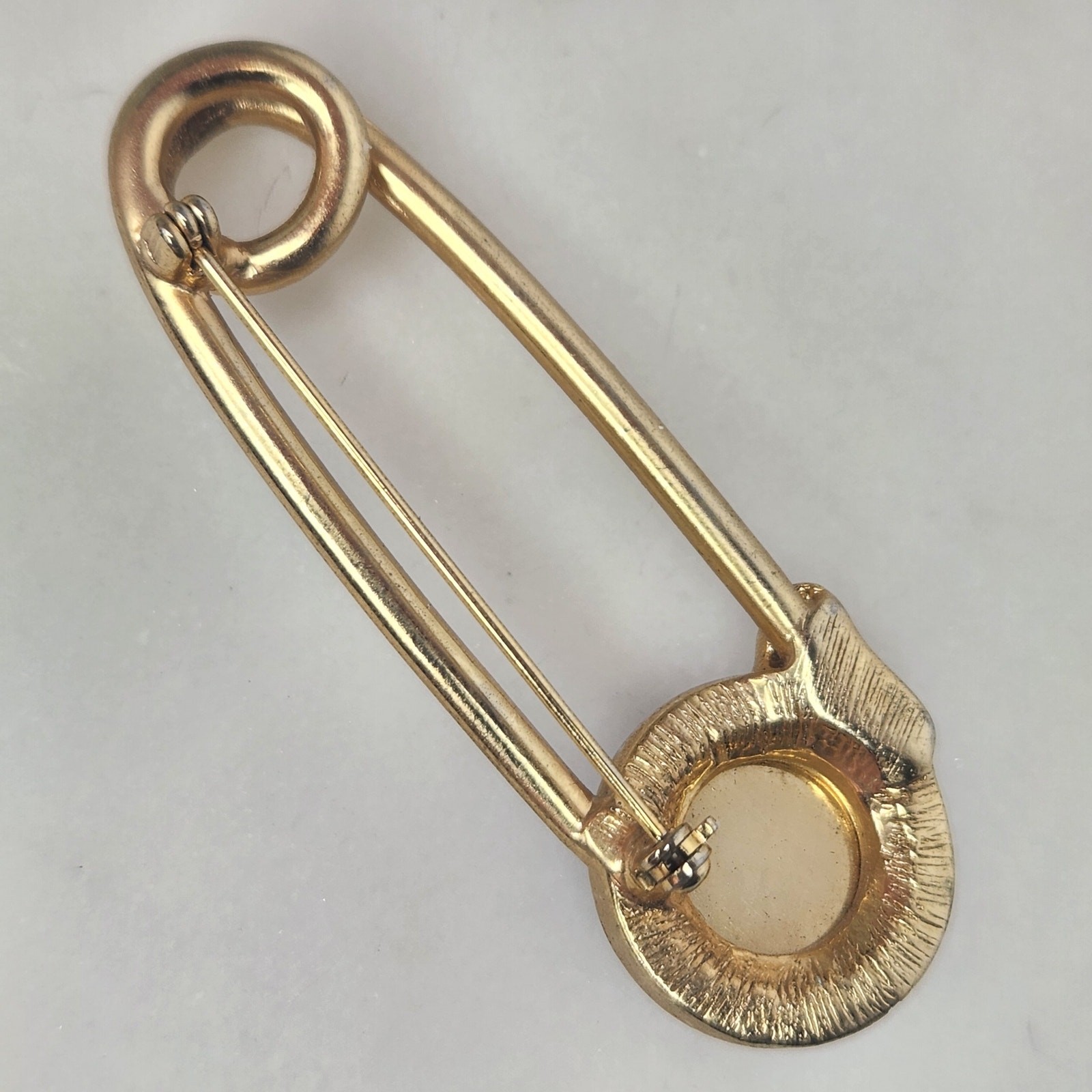 Vintage Swank Gold Tone Safety Pin Brooch Blue Cabochon Stone Lapel Pin MCM