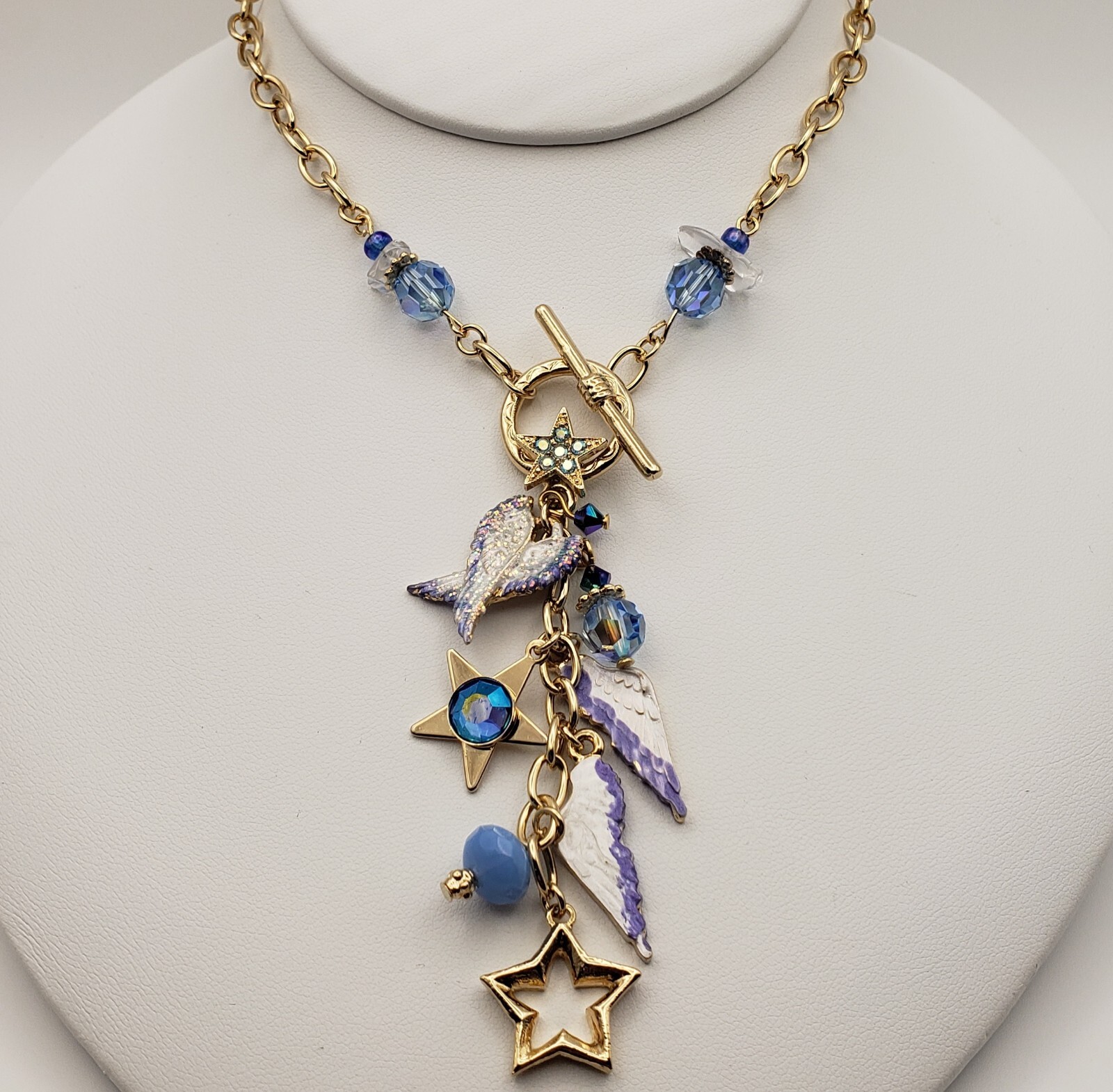 Kirks Folly Forever Angel Wings Charm Necklace Gold Tone 17in Long Blue Crystals