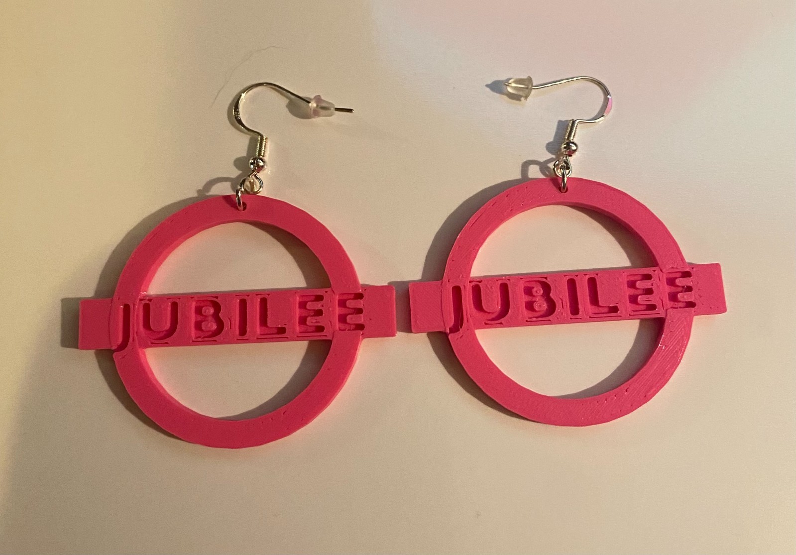 3D-printed earrings based on Jubilee from the X-Men franchise