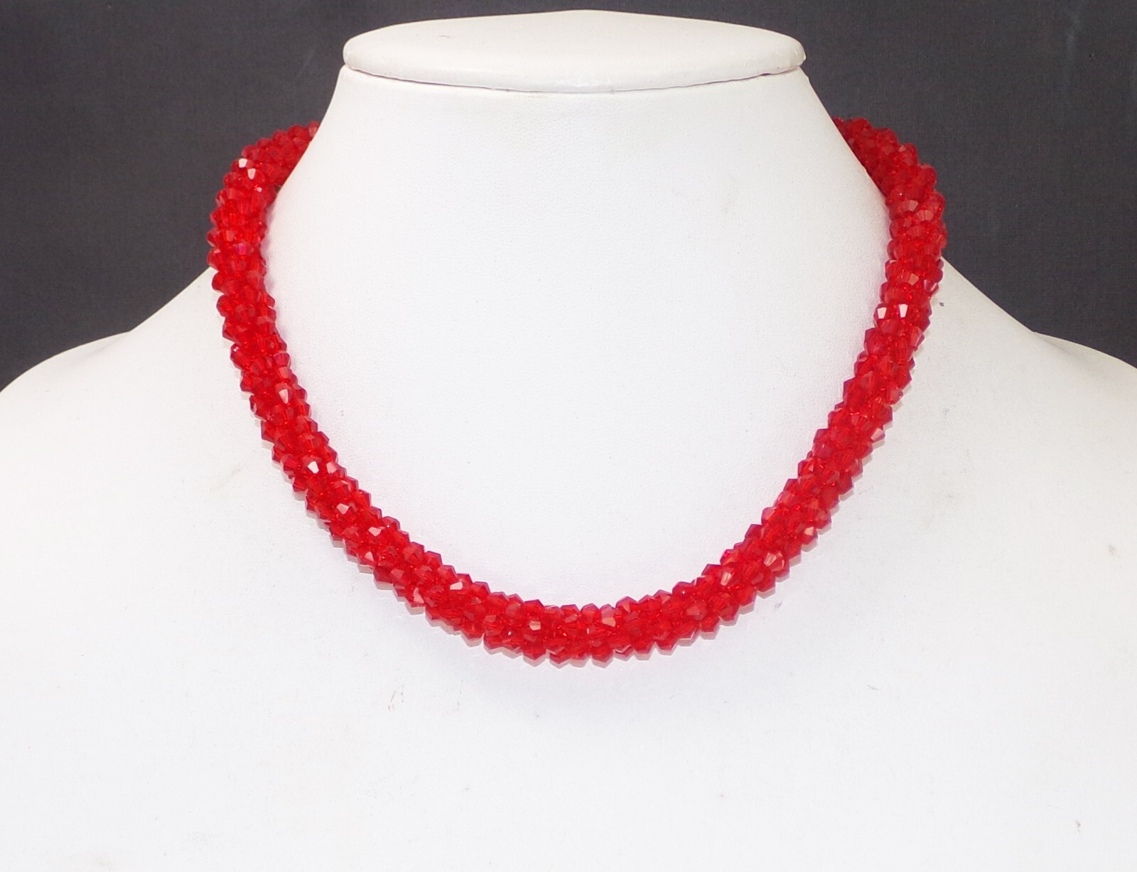 Red glass beaded necklace in a sparkling thick cluster beaded rope design New