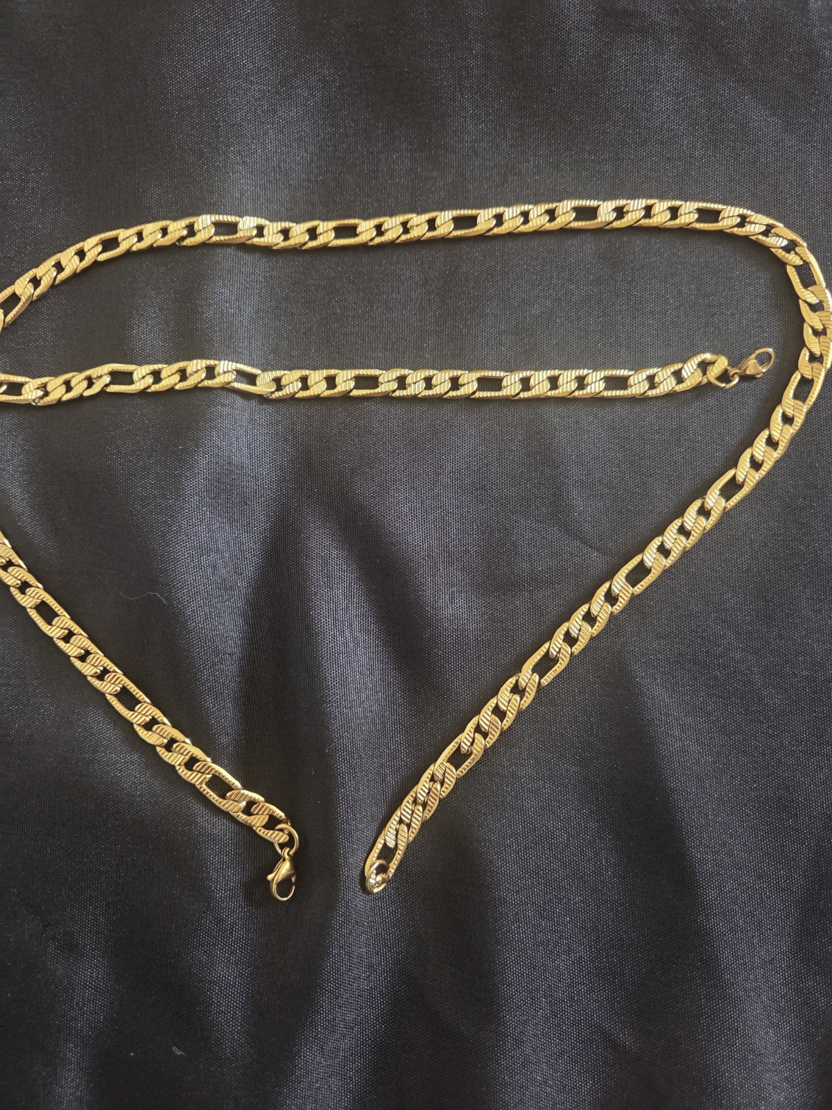 Gold Tone Figaro Chain Bracelet with Lobster Clasp, No Stone