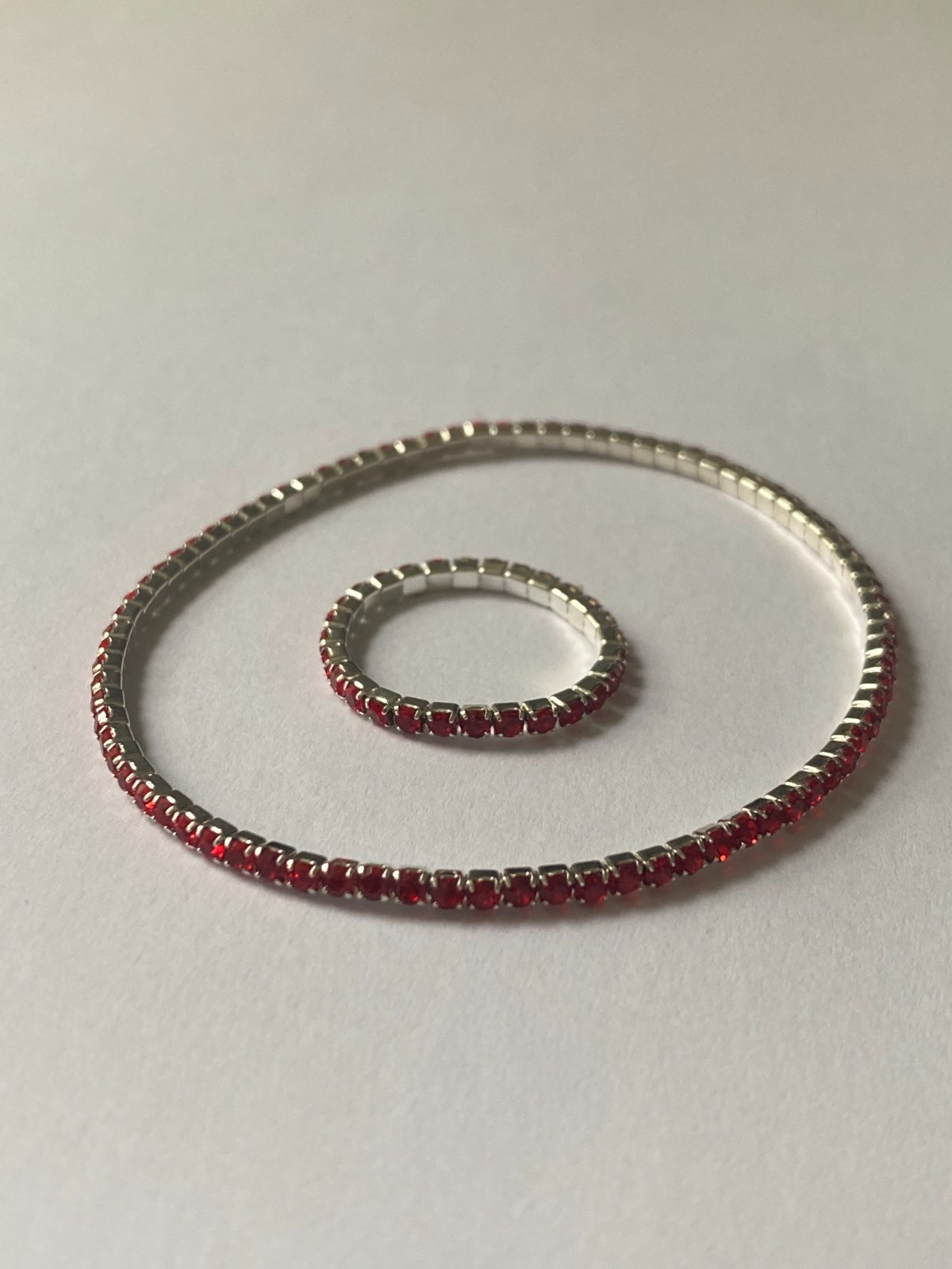 5 stretchy bracelets and 4 stretchy rings, shiny and new