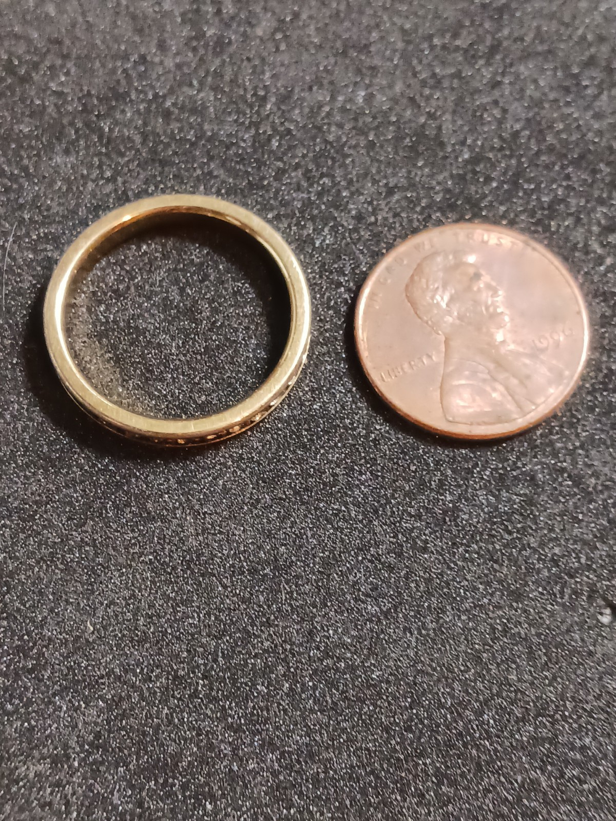 4 Beautiful Rings 3 with no markings 1 stamped M with a Trademark Nice