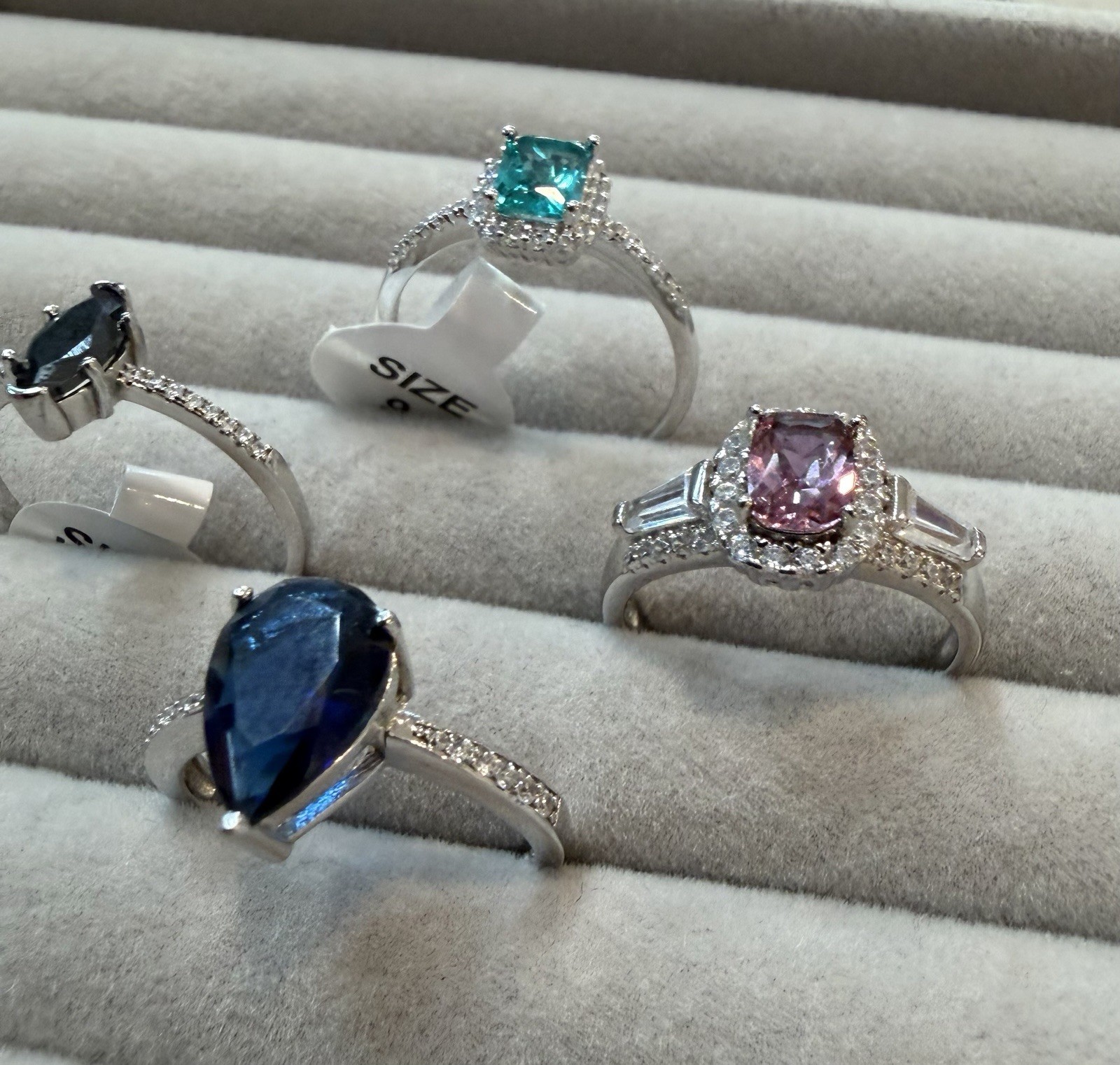 Sterling silver cocktail rings. Lab created gemstones. Lot of 4 rings