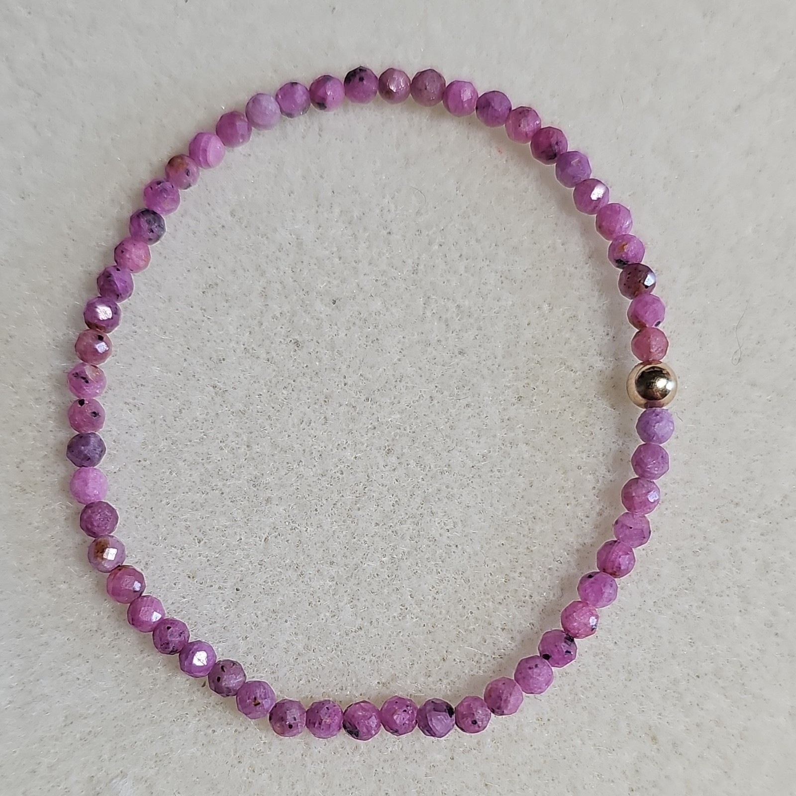 Faceted Ruby Beads Bracelet Round Beads with 10kt Gold Spacer Bead Stretchy