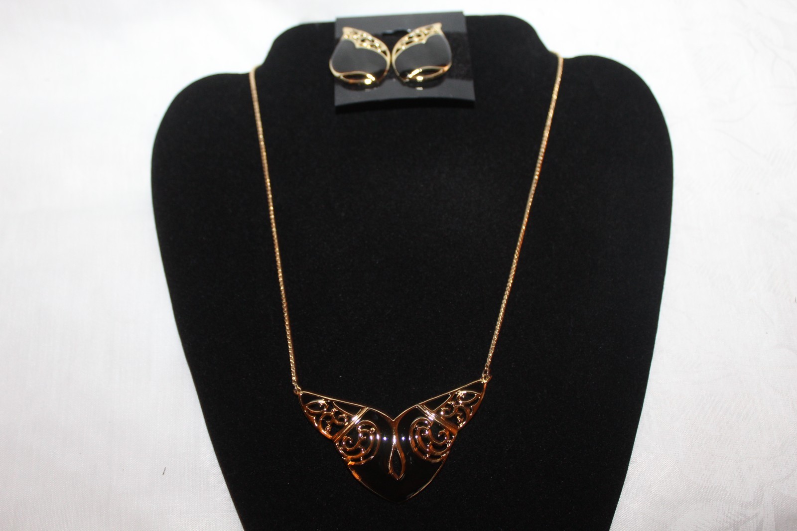 Filligree style necklace 17in and earrings. Gold plated with black emerald inlay