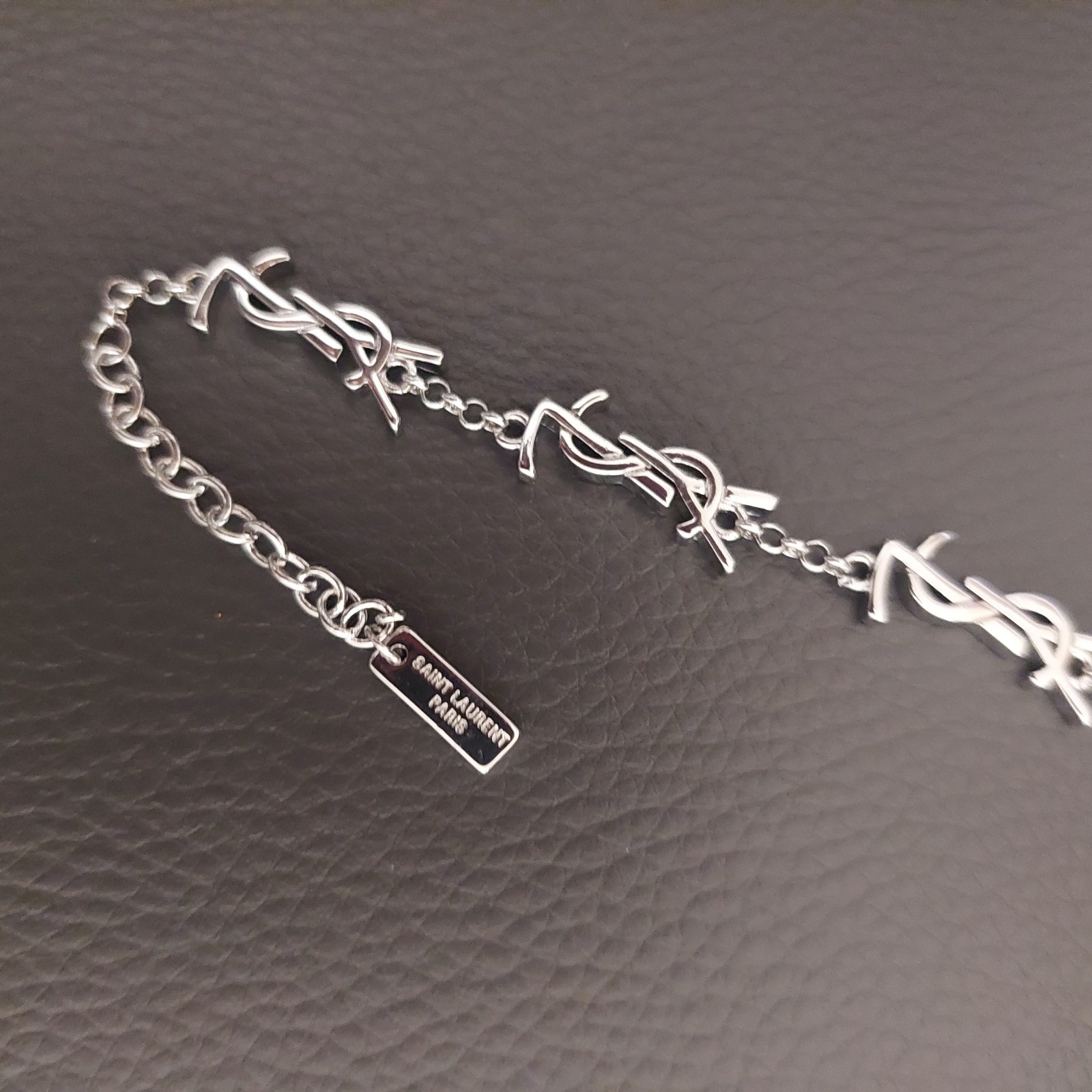 YSL Saint Laurent Silver Tone Logo Charm Bracelet