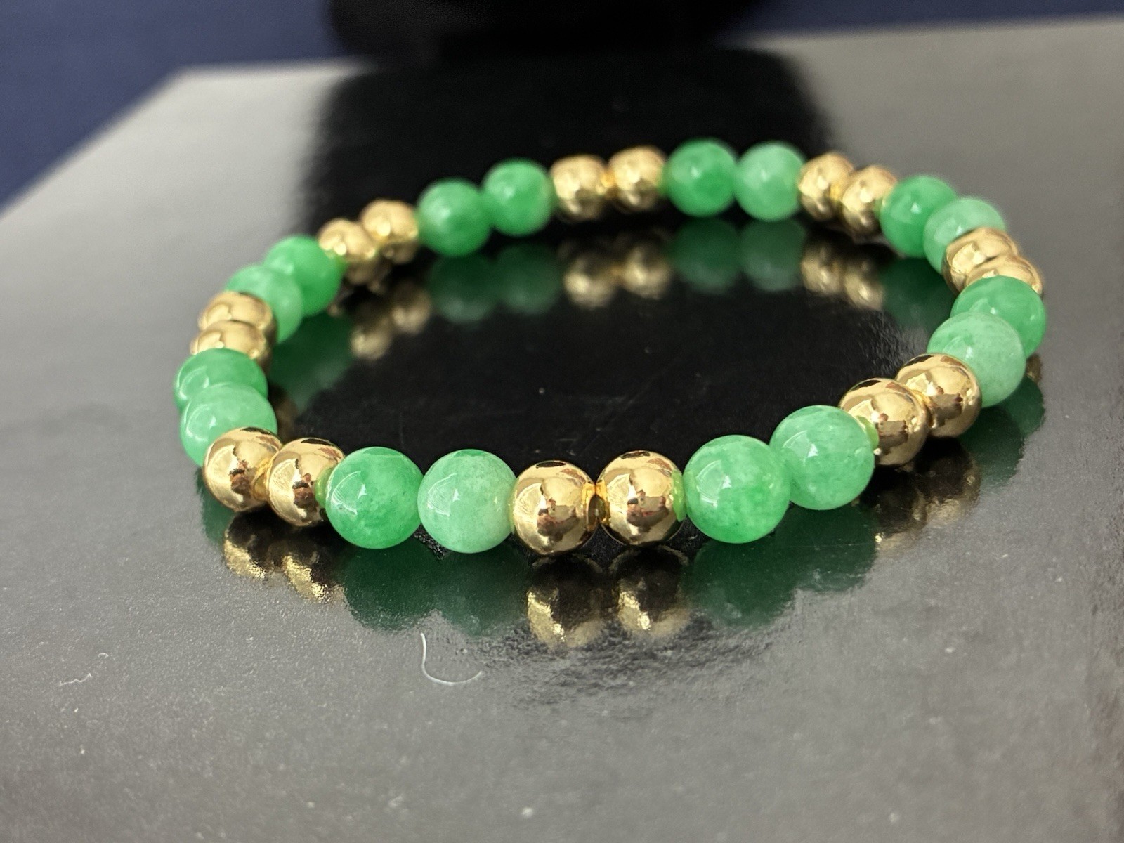 Green Stone Round Beaded Stretch Bracelet Gold Tone Spacer Beads