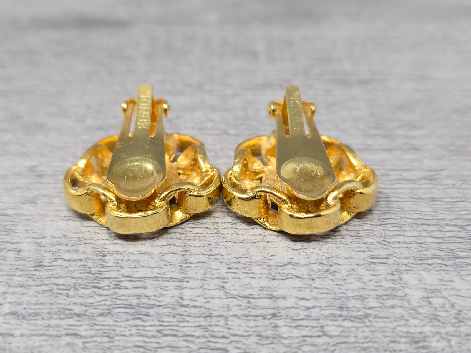 Vintage Fendi Coutre Clip On Earrings Gold Tone Spell Out