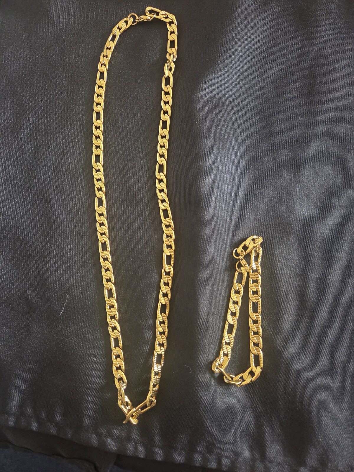 Gold Tone Figaro Chain Bracelet with Lobster Clasp, No Stone