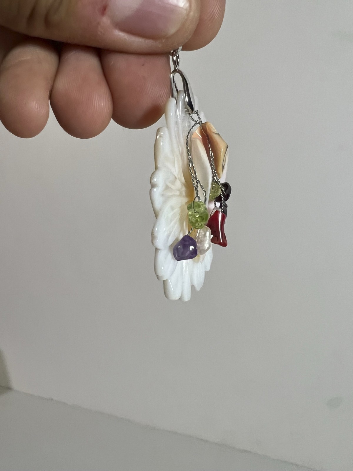 Handcarved Mother of Pearl Shell Floral Pendant. No maker mark found.