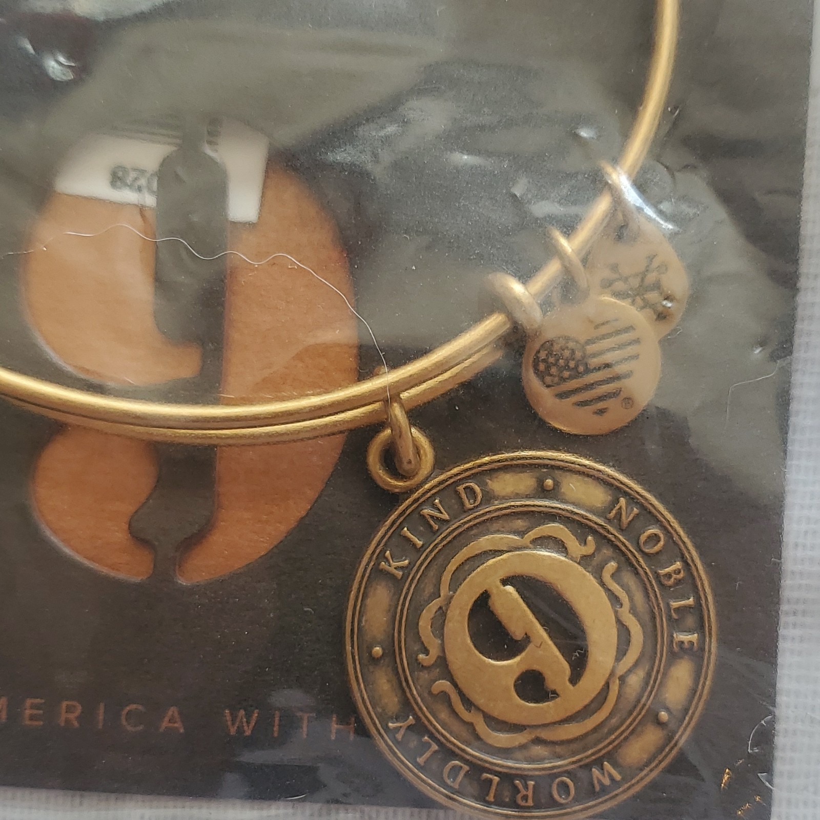 Alex and Ani # 9 divine completion, universal love, and the humanitarian.