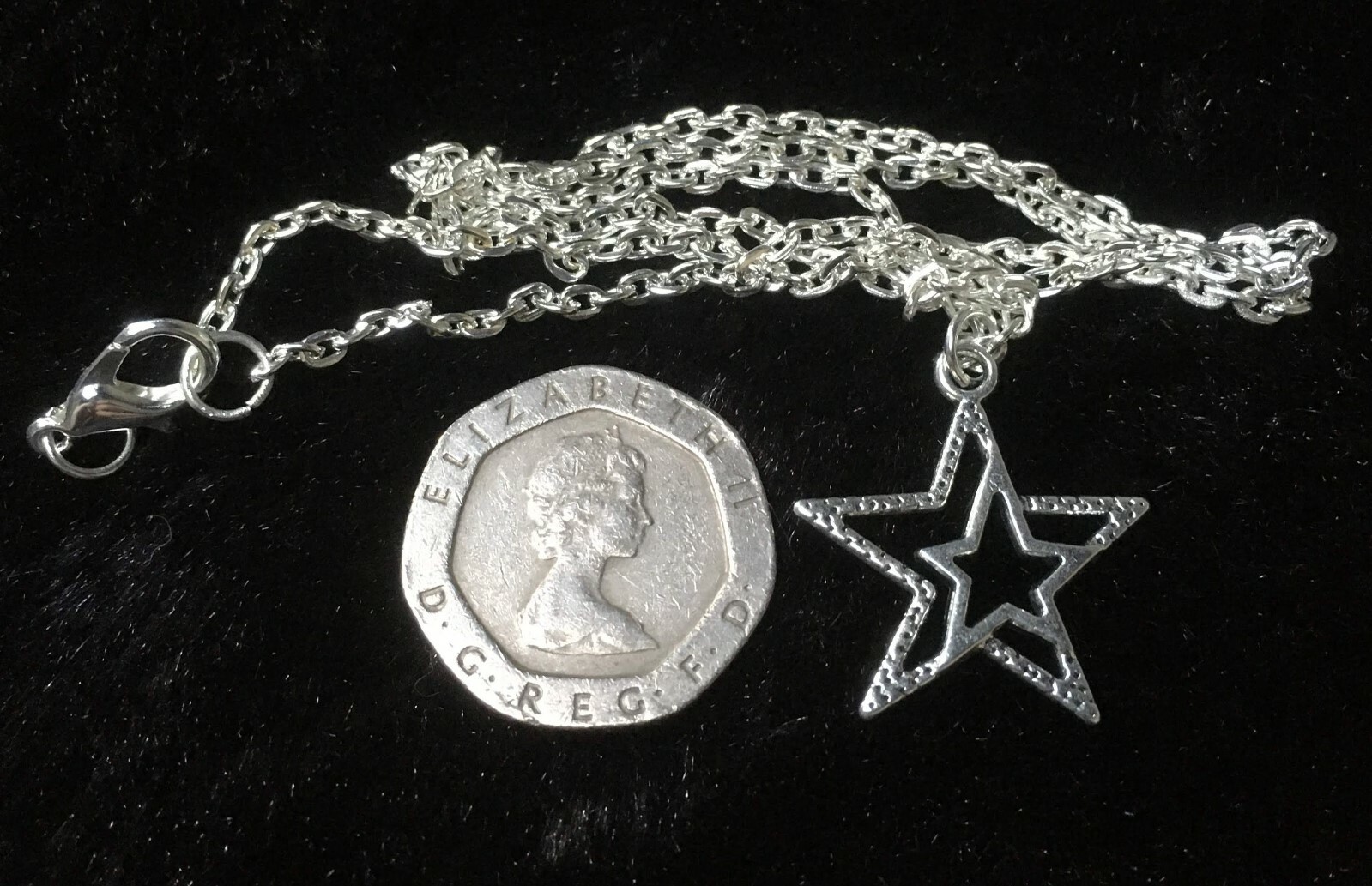 TIBETAN SILVER STAR PENDANT ON SILVER PLATED 16 INCH CHAIN