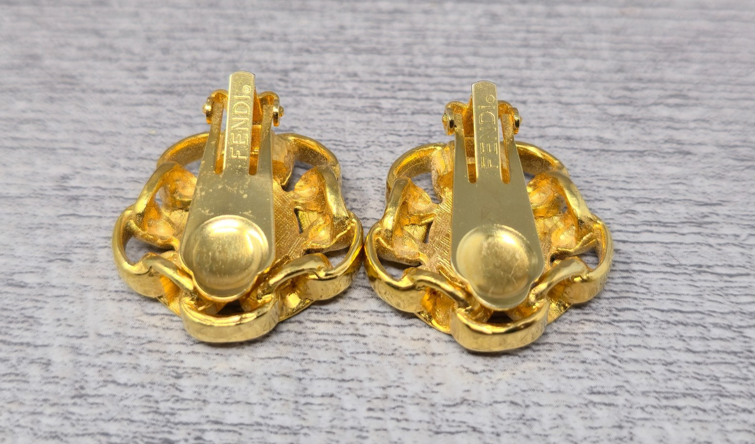 Vintage Fendi Coutre Clip On Earrings Gold Tone Spell Out