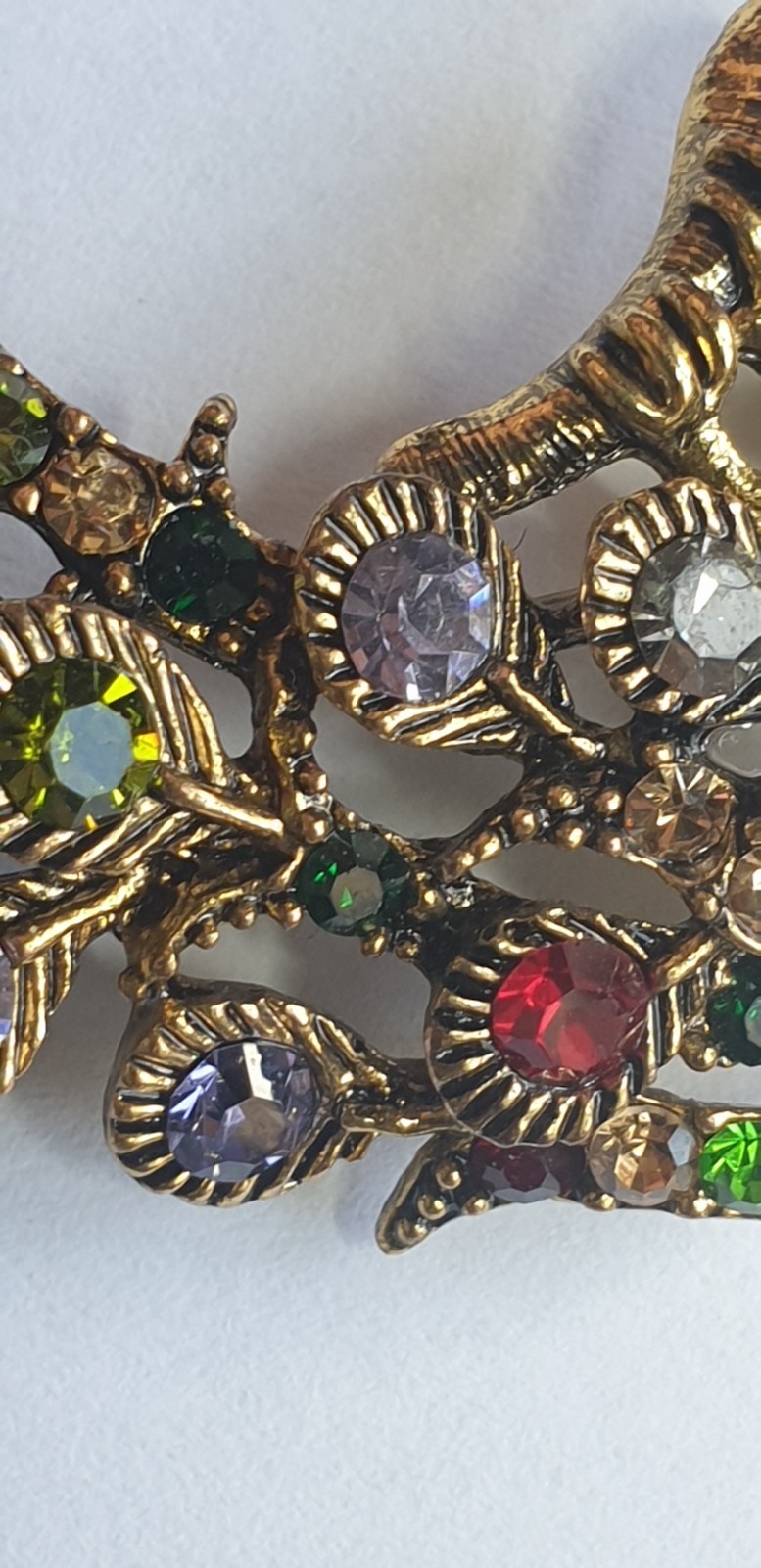 Peacock Brooch. Gold tone with Multicoloured glass beads . 84mm x 28mm.