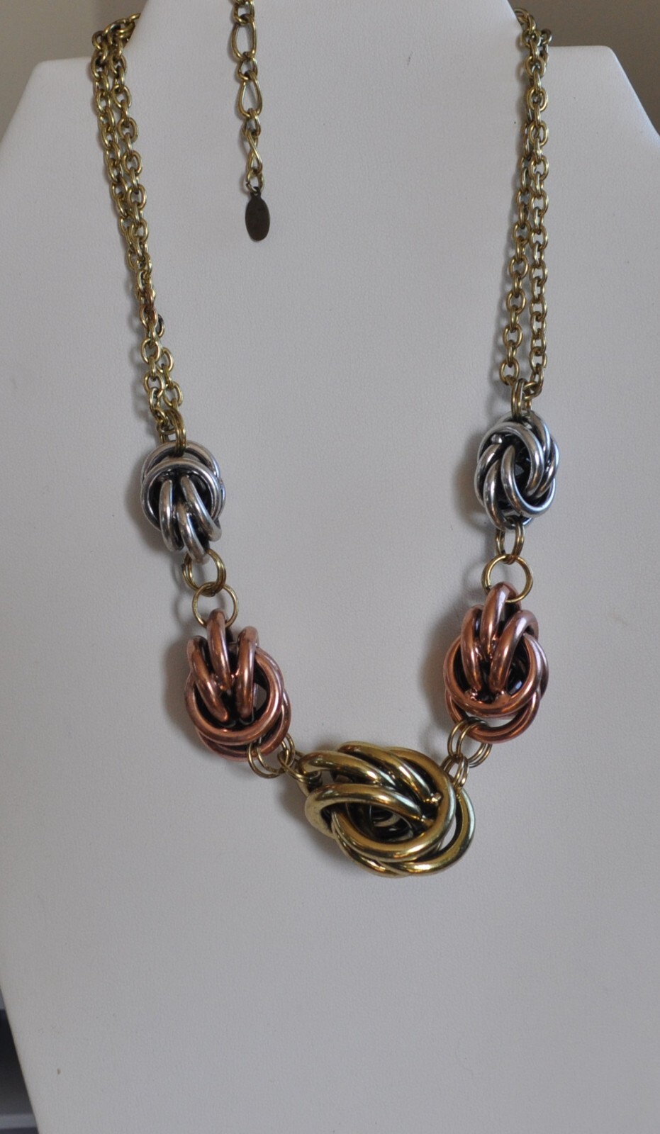 KIRKS FOLLY LOVE KNOT TRI COLOR GOLD, SILVER, ROSE TONE NECKLACE AND EARRING SET