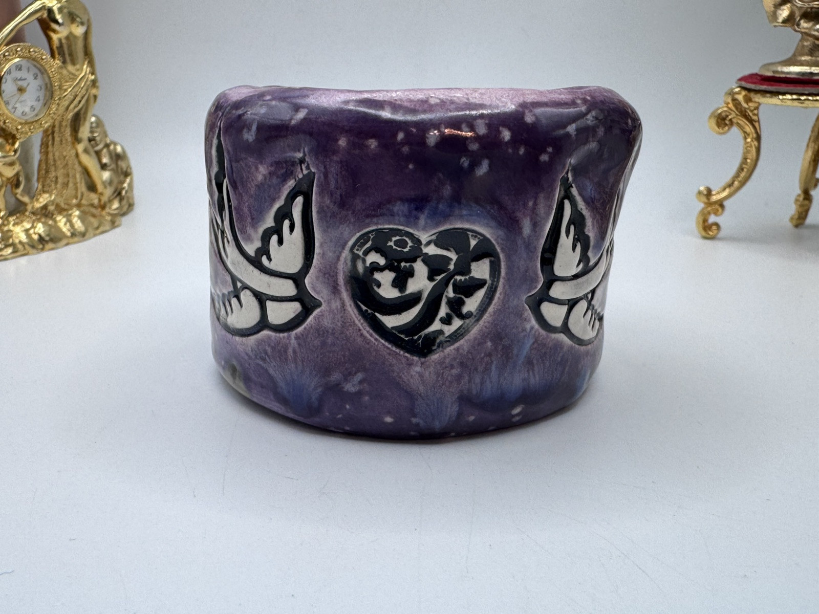 Rare signed SR ceramic bracelet, purple enamel, with heart and dove design