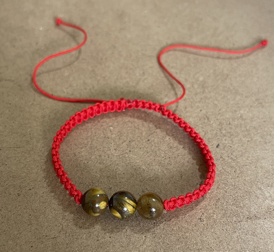 Pulsera Roja Ojo de Tigre para la proteccion general de la vida. Año Del Tigre