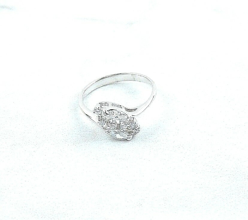 Sterling Silver .70 cttw Marquise And Round Cubic Zirconia Ring