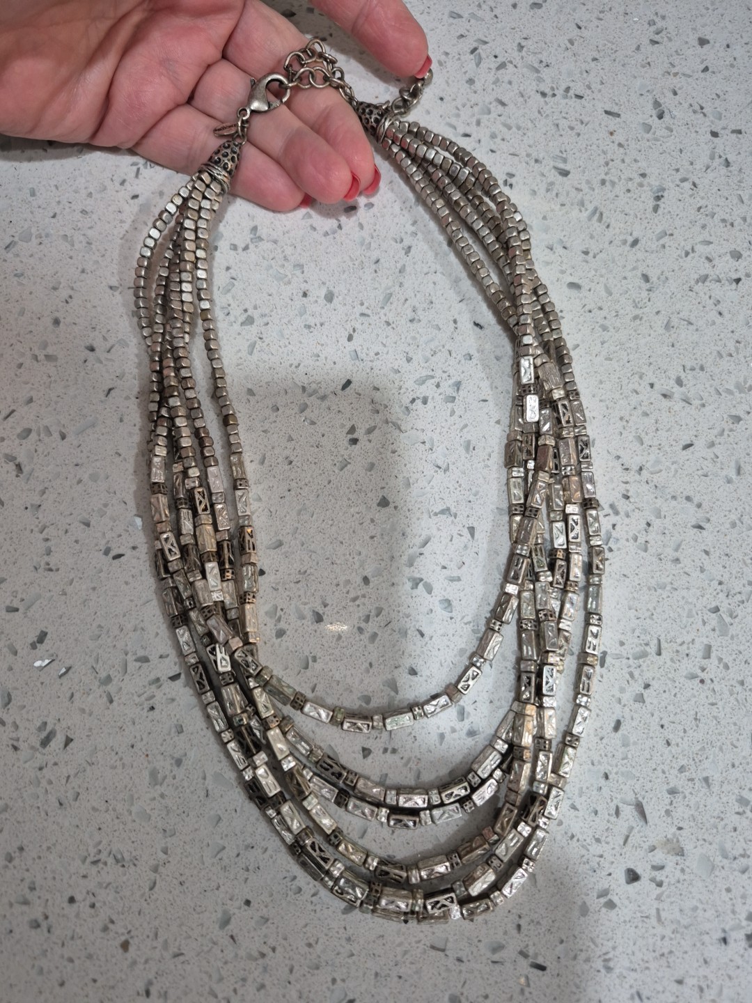 Beautiful strand of metal beads a timeless piece. dress it up or down heavy