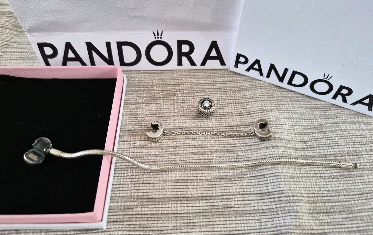 PANDORA Bracelet 7-inch with 4 Charms, Safety Chain, And Original Packaging