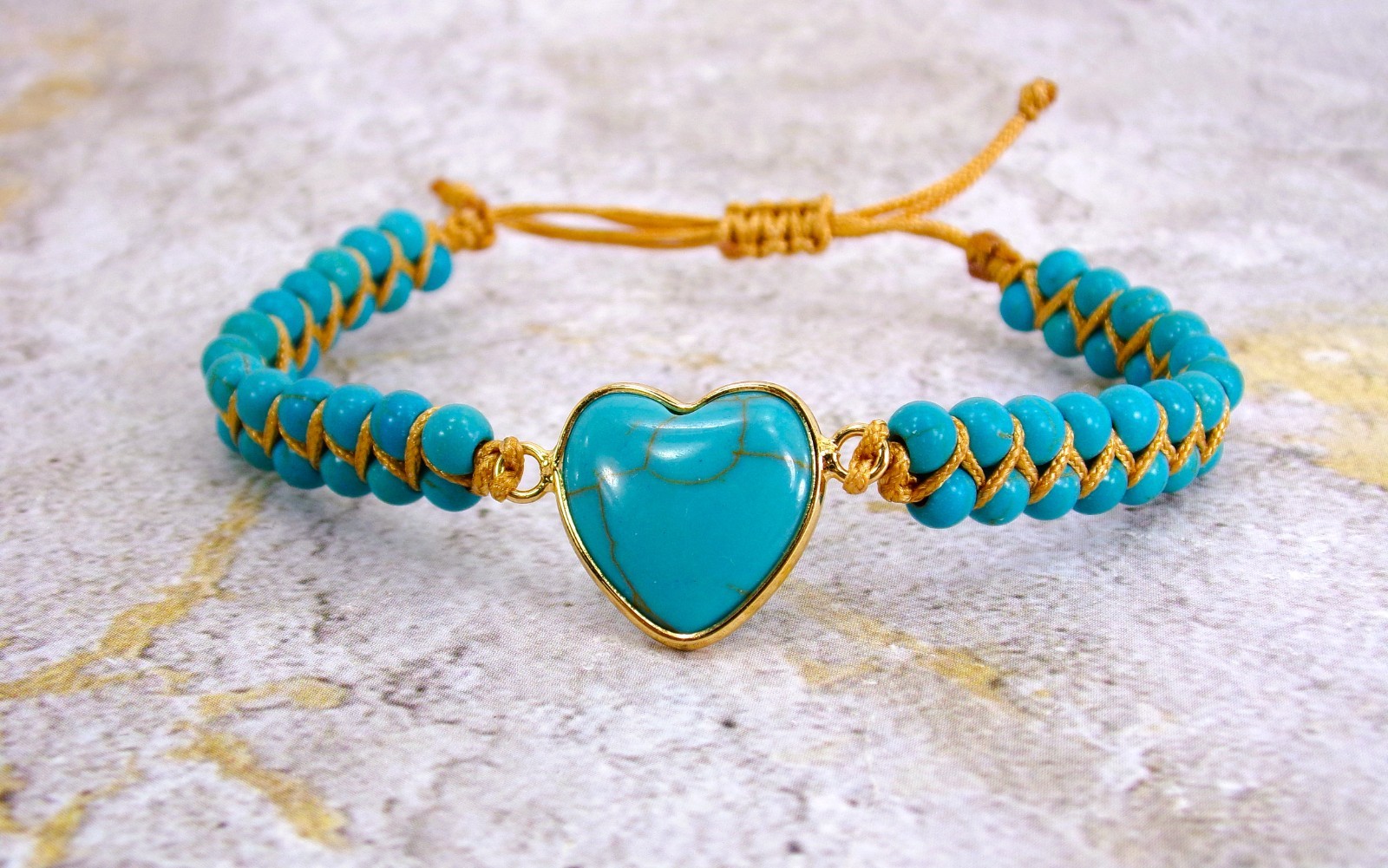 Turquoise stone heart bracelet with all round stones brown cord adjustable New