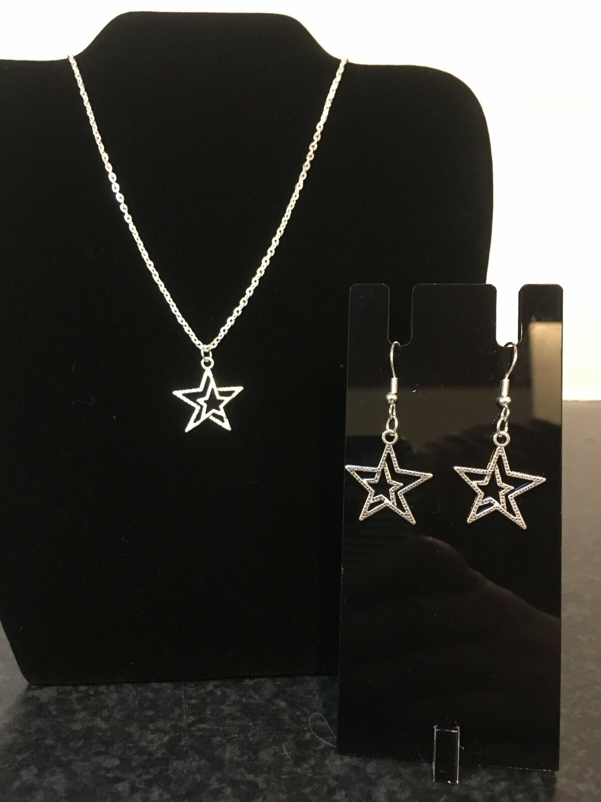 TIBETAN SILVER STAR PENDANT ON SILVER PLATED 16 INCH CHAIN