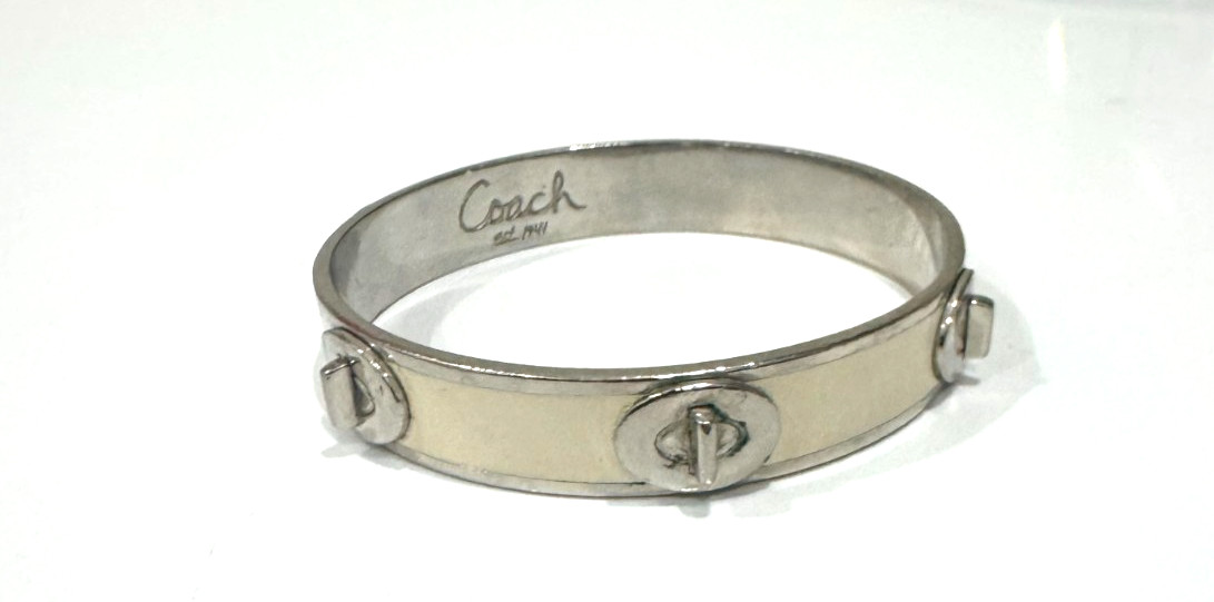 Coach Signature Silver / Cream Accent Tone Bangle Bracelet