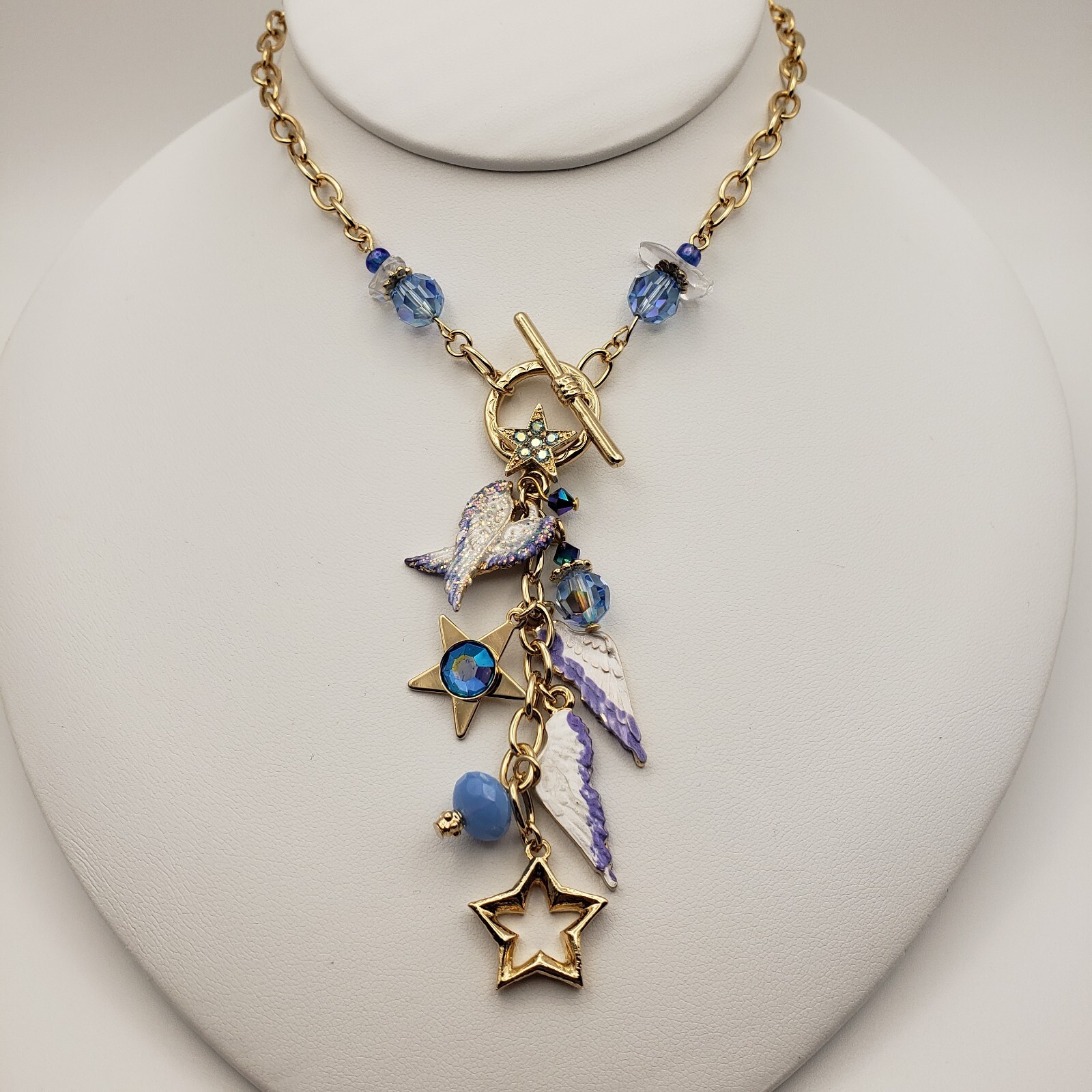 Kirks Folly Forever Angel Wings Charm Necklace Gold Tone 17in Long Blue Crystals