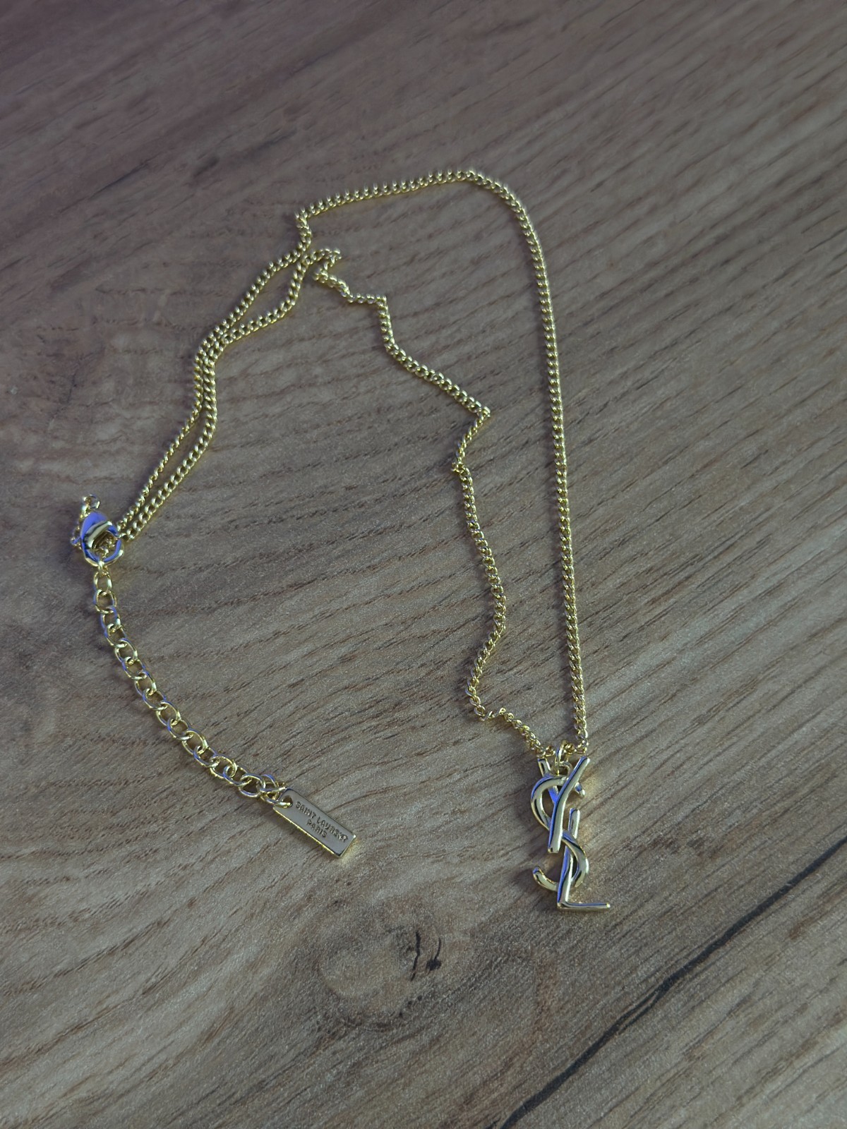 Saint Laurent YSL Monogram Pendant Gold Tone Necklace Adjustable Chain Luxury