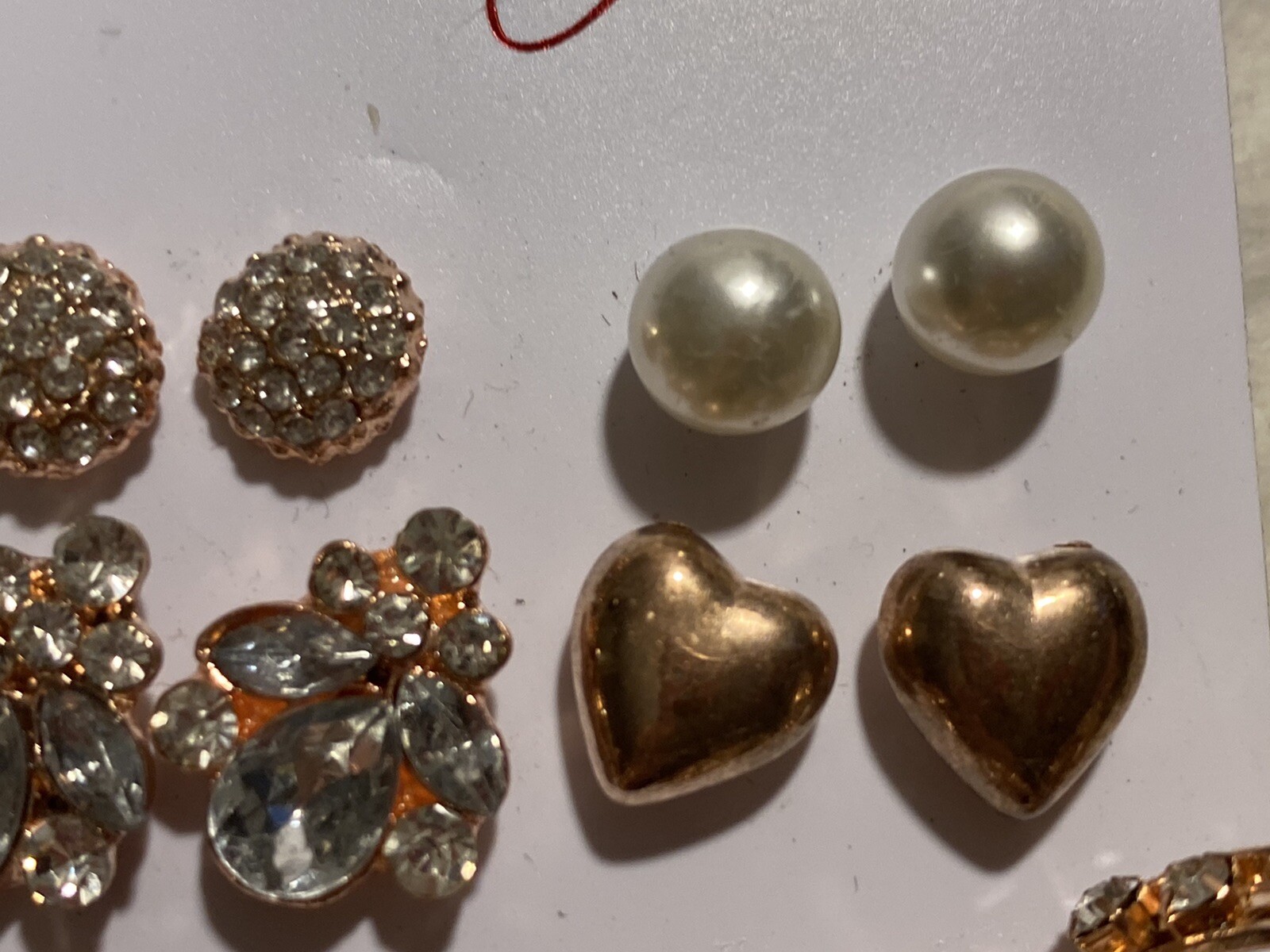 8 Pair Of Pierced Earrings On A Card