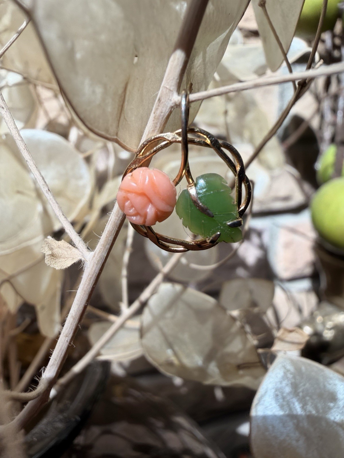 14k Floral pendant featuring a handcarved pink coral rose and a green jade leaf