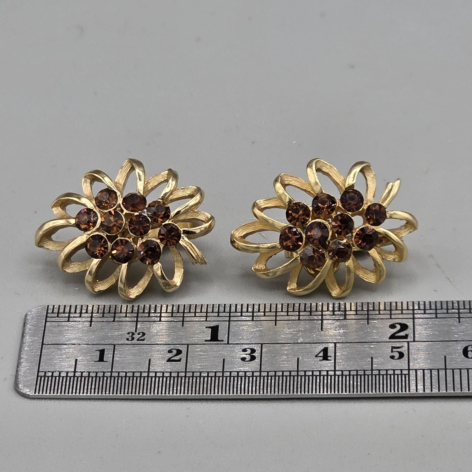 Vintage Trifari Gold Tone Floral Clip On Earrings with Brown Rhinestones