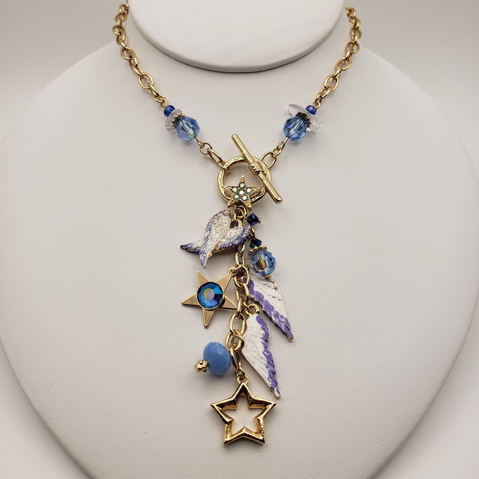 Kirks Folly Forever Angel Wings Charm Necklace Gold Tone 17in Long Blue Crystals