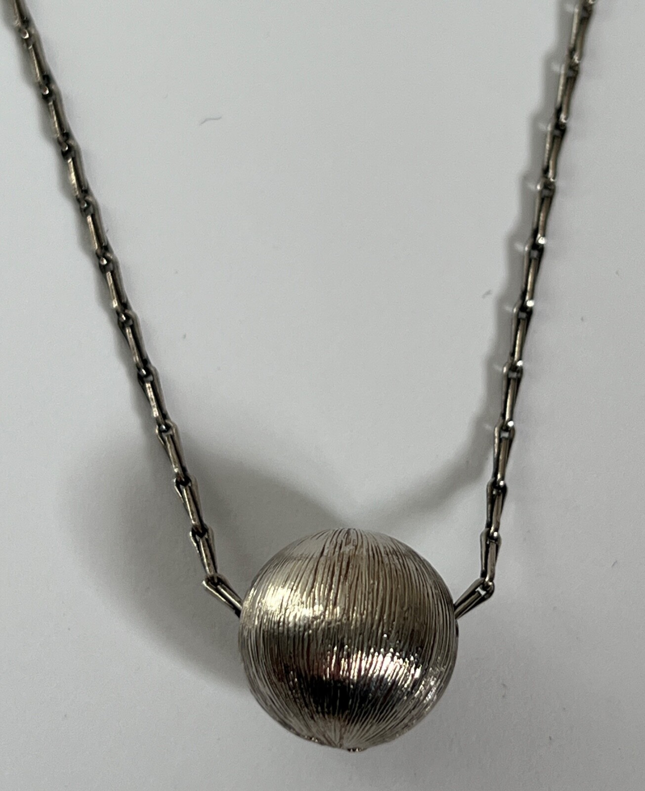 NIB Saint Laurent YSL Spherical Ball Pendant Silver Brass Chain Necklace $695