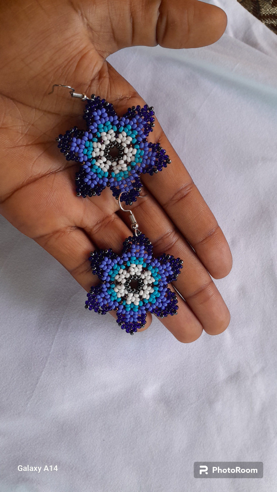 42 BEADED HANDMADE BRACELETS AND 28 PAIRS OF BEADED HANDMADE EARRINGS(LOT OF 70)