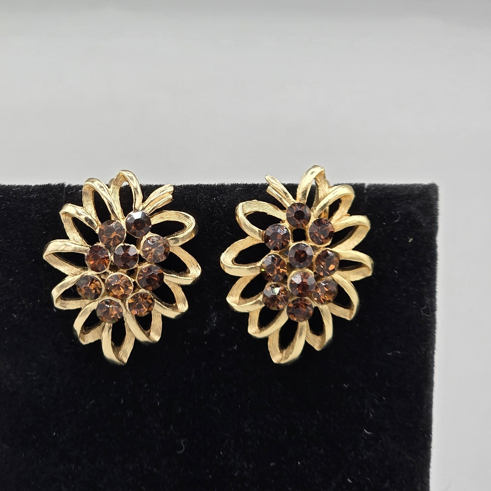 Vintage Trifari Gold Tone Floral Clip On Earrings with Brown Rhinestones