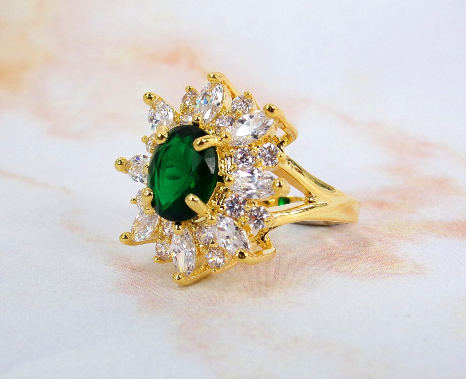 Large green oval cubic zirconia stone ring with clear marquise round CZ stones