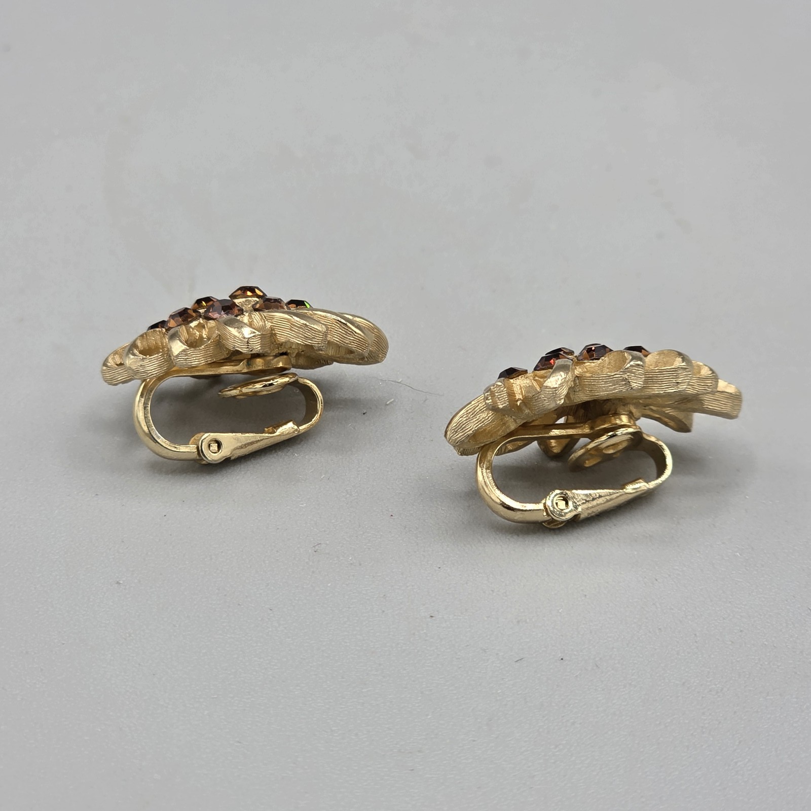 Vintage Trifari Gold Tone Floral Clip On Earrings with Brown Rhinestones