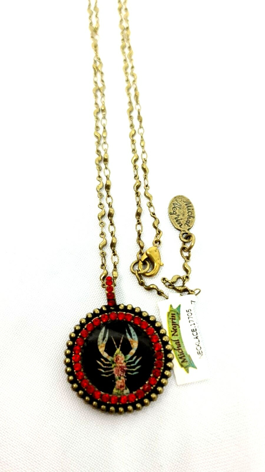Lovely round Metal Necklace By Michal Negrin Red Crystal Cancer Sign.