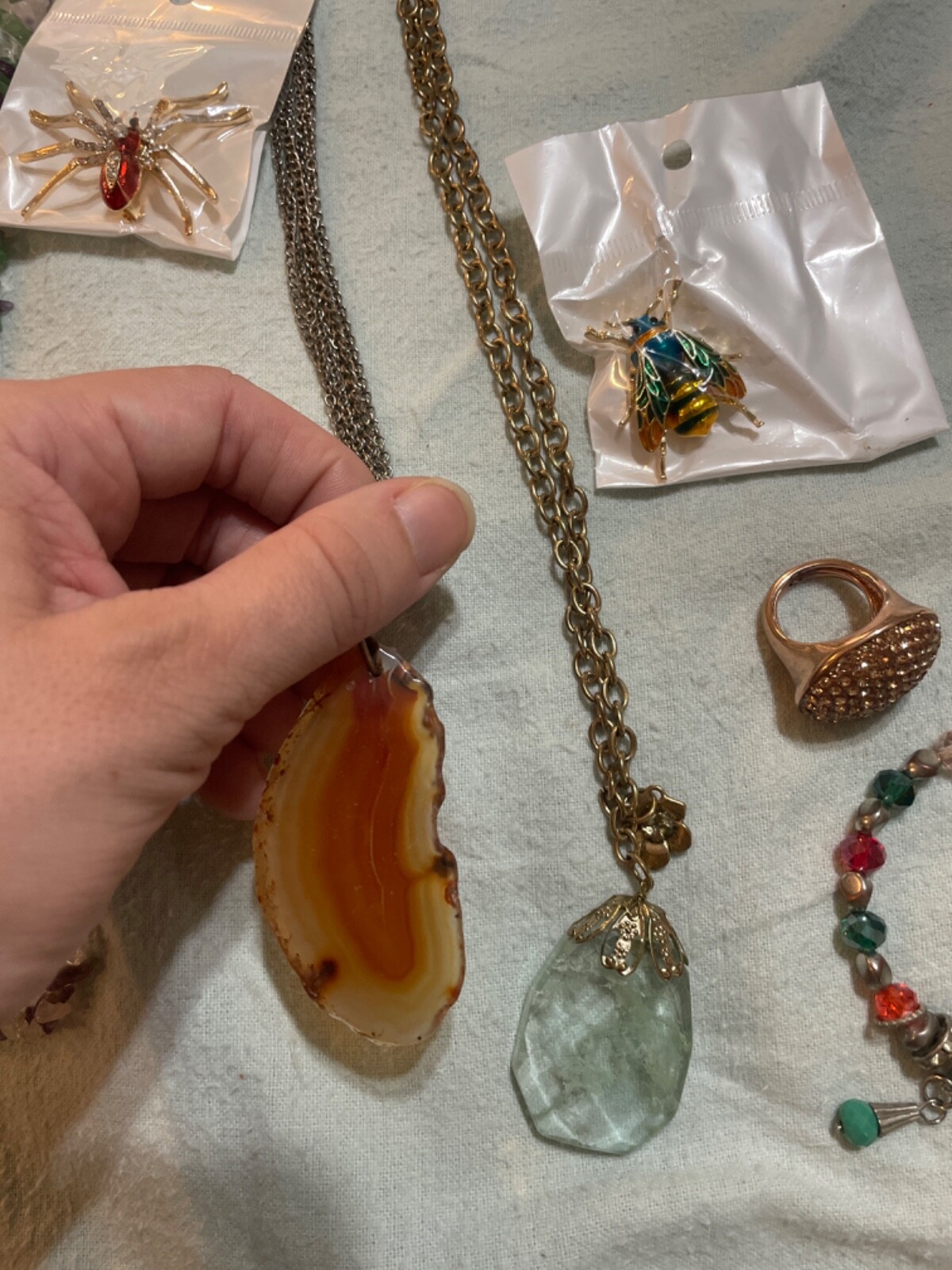 set amethyst necklace with enamel butterfly gold tone broch and 2 necklaces wit